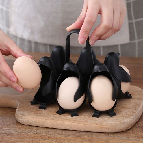 letak telur dalam rak telur berbentuk penguin comel ini untuk dapur anda